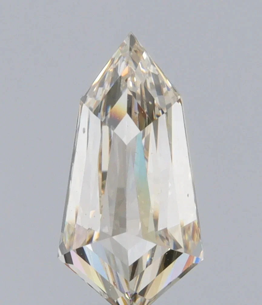 0.72ct | Champagne VVS Kite Shape Step Cut Diamond