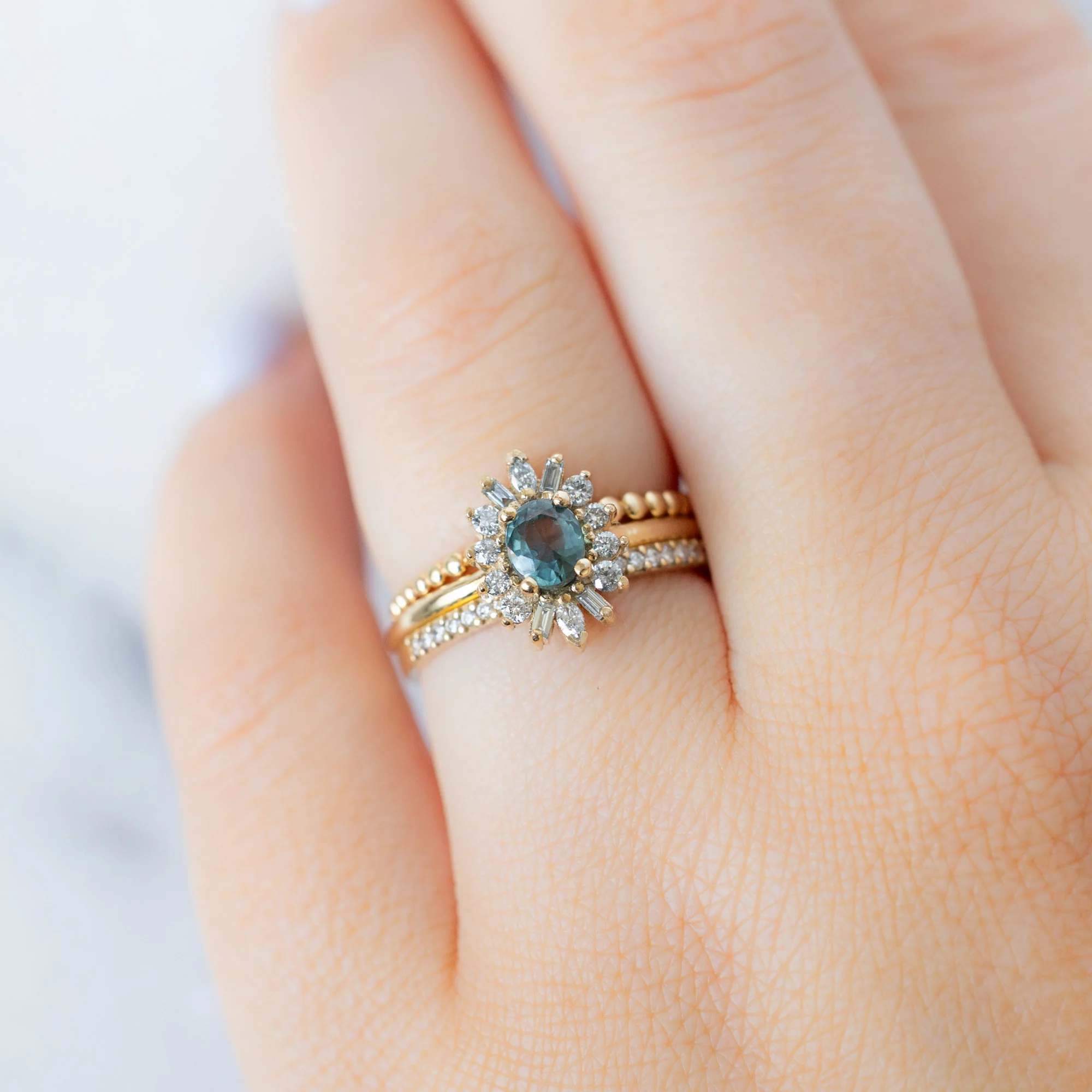 The Camellia Ring | 0.81ct Oval Blue Montana Sapphire in 14K Yellow Gold - Image 2