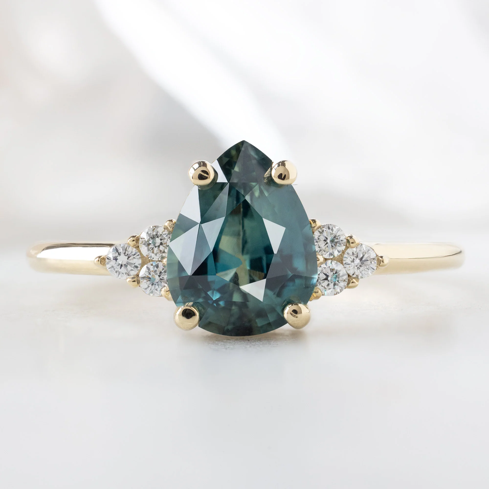 The Ivy Ring | 1.37ct Pear Montana Sapphire in 14K Yellow Gold
