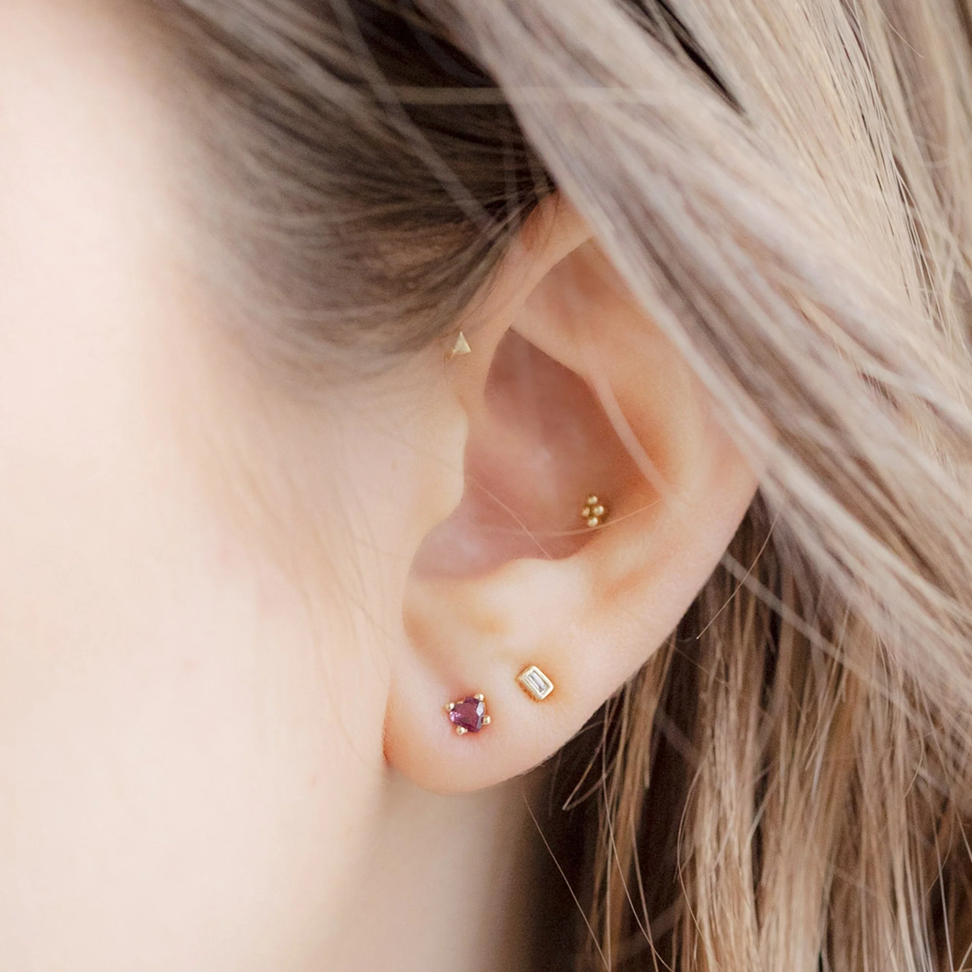 The Teensy Ruby Heart Studs | Yellow Gold - Image 2